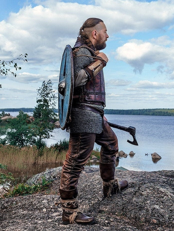 Viking leather armor with brass accents
