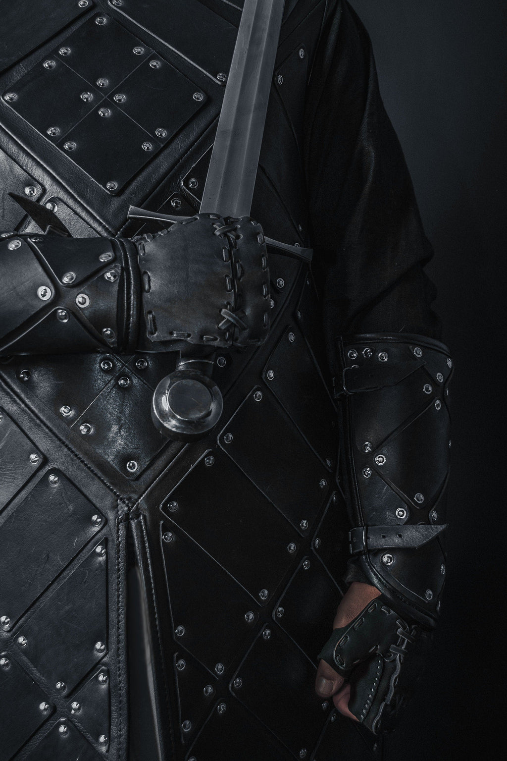 Medieval leather bracers with hand protection