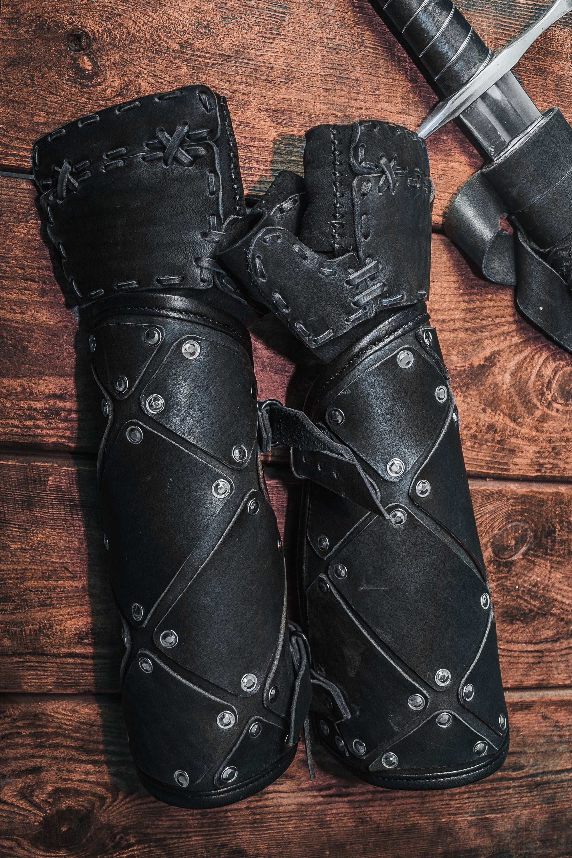 Medieval leather bracers with hand protection