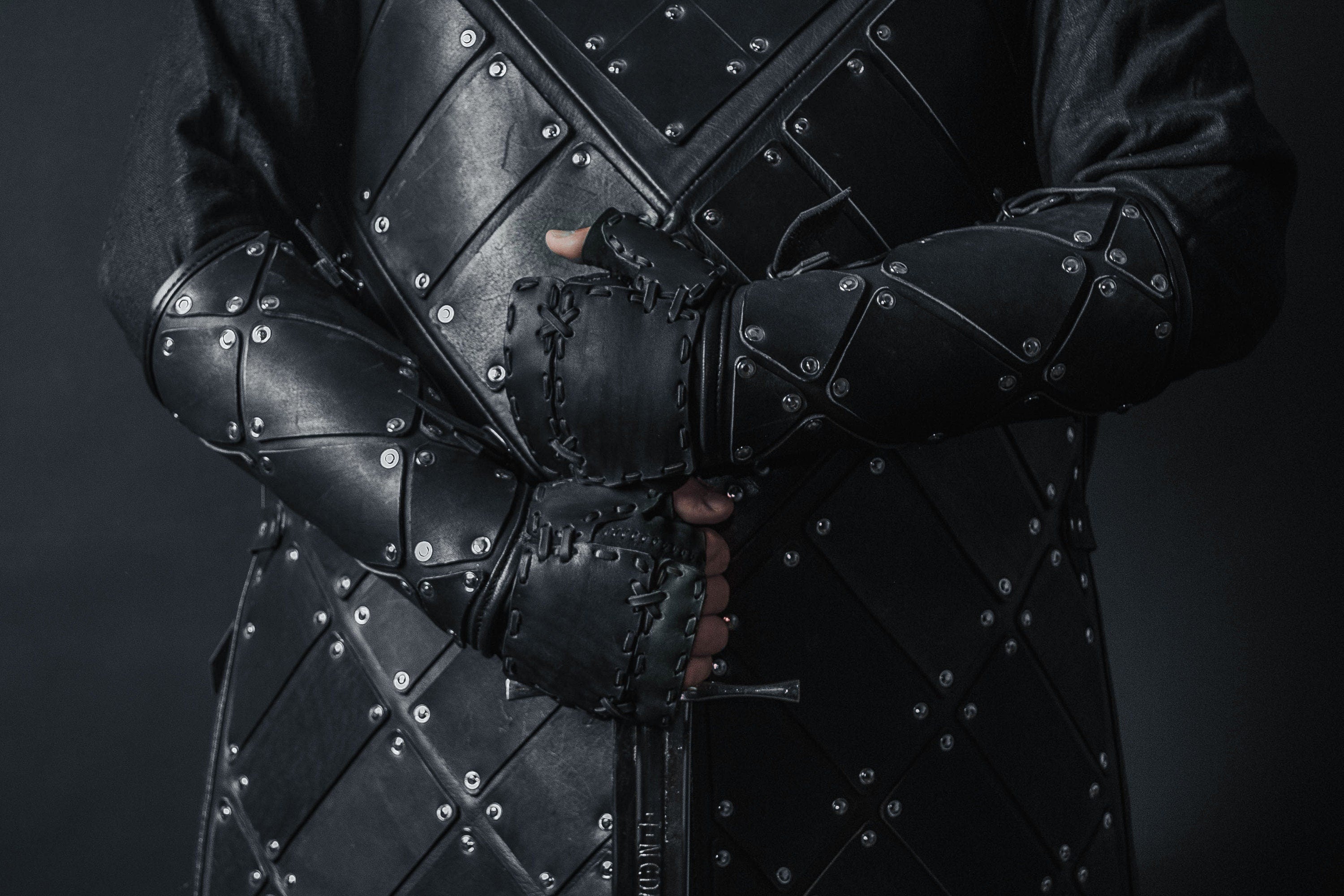 Medieval leather bracers with hand protection