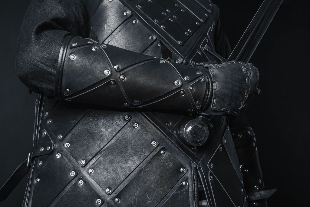 Medieval leather bracers with hand protection