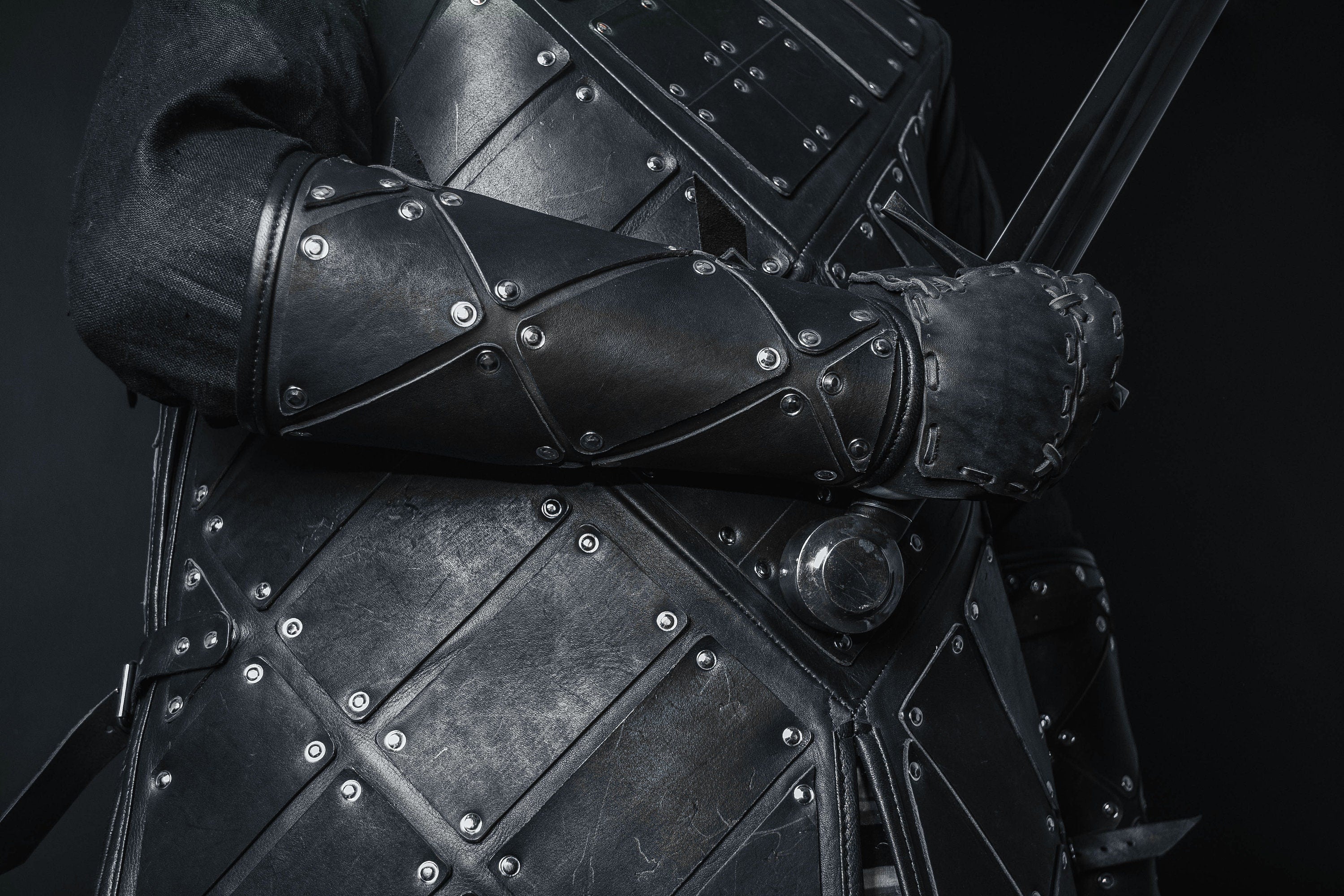 Medieval leather bracers with hand protection