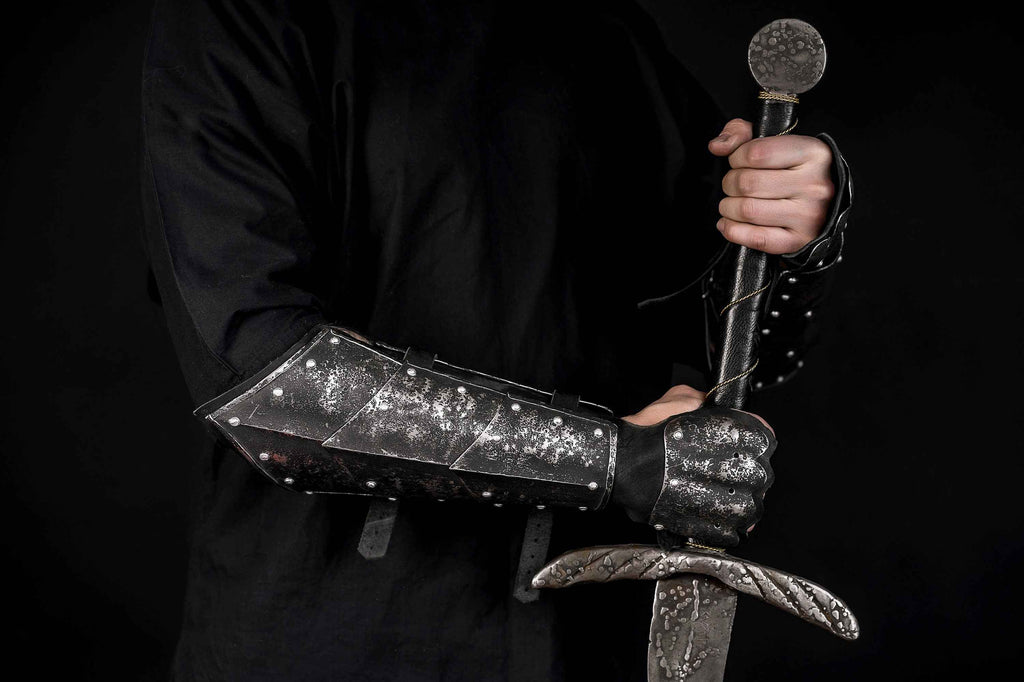 Medieval leather bracers with hand protection