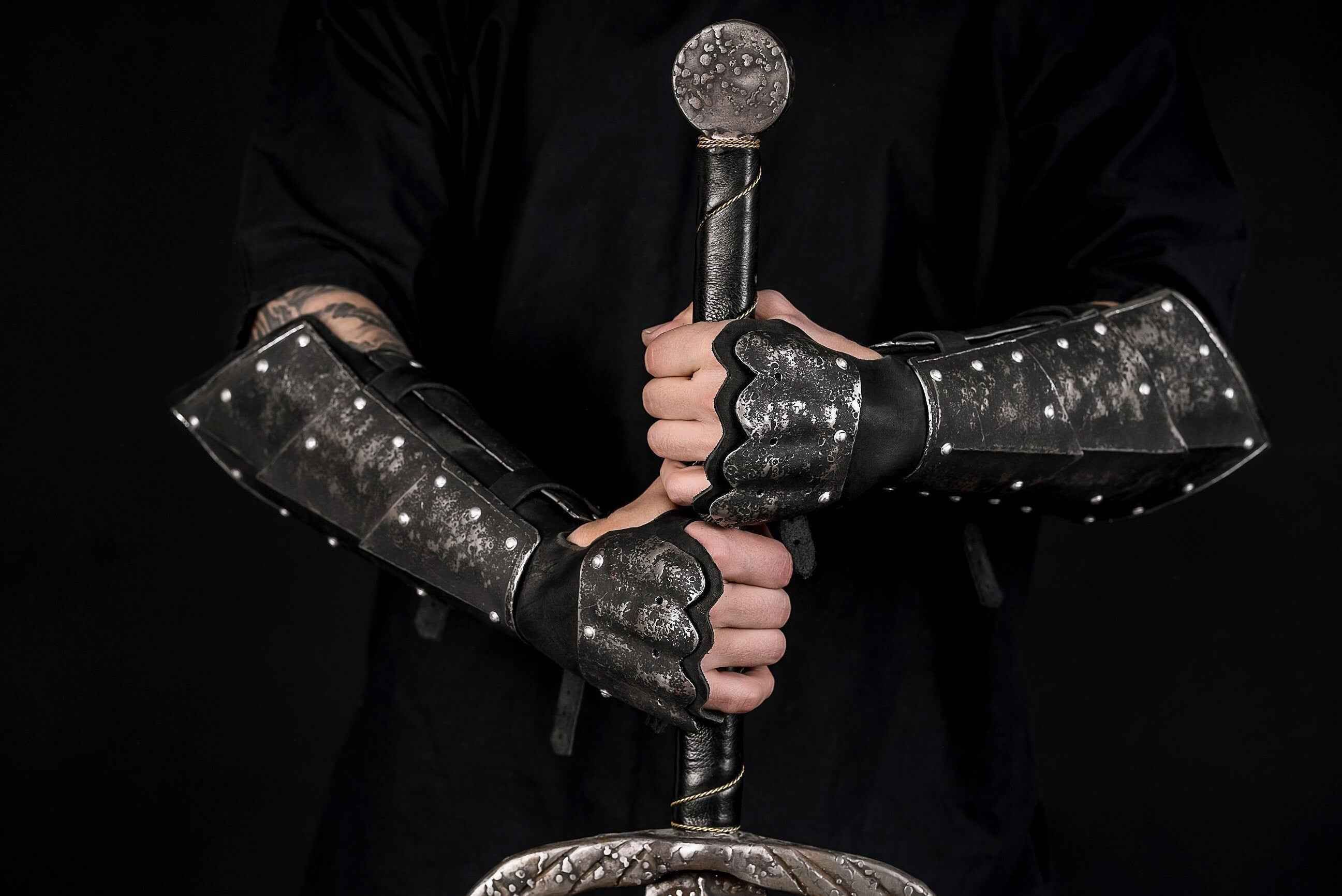 Medieval leather bracers with hand protection