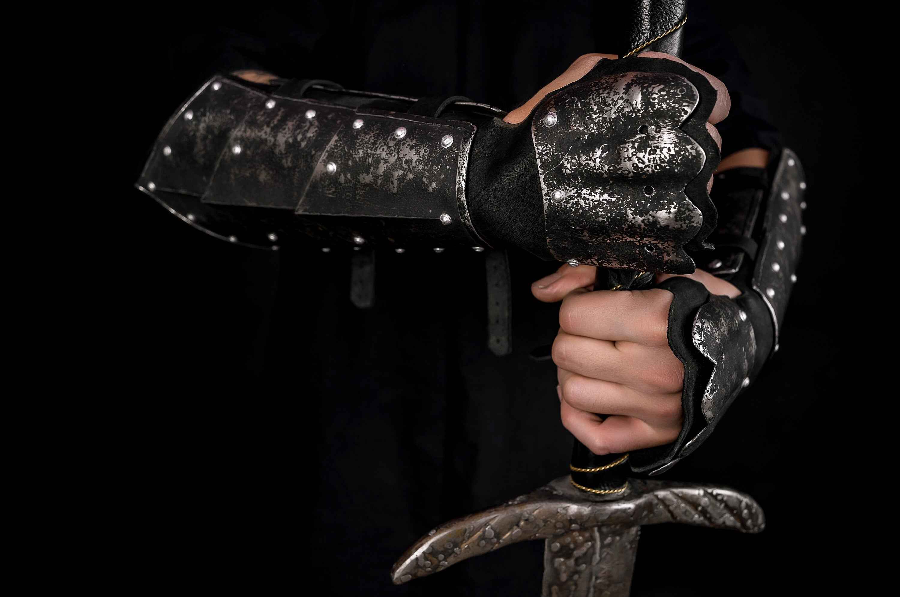 Medieval leather bracers with hand protection